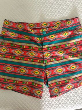 Chubbies Men's Swim Board Shorts in Red, Teal, Yellow
